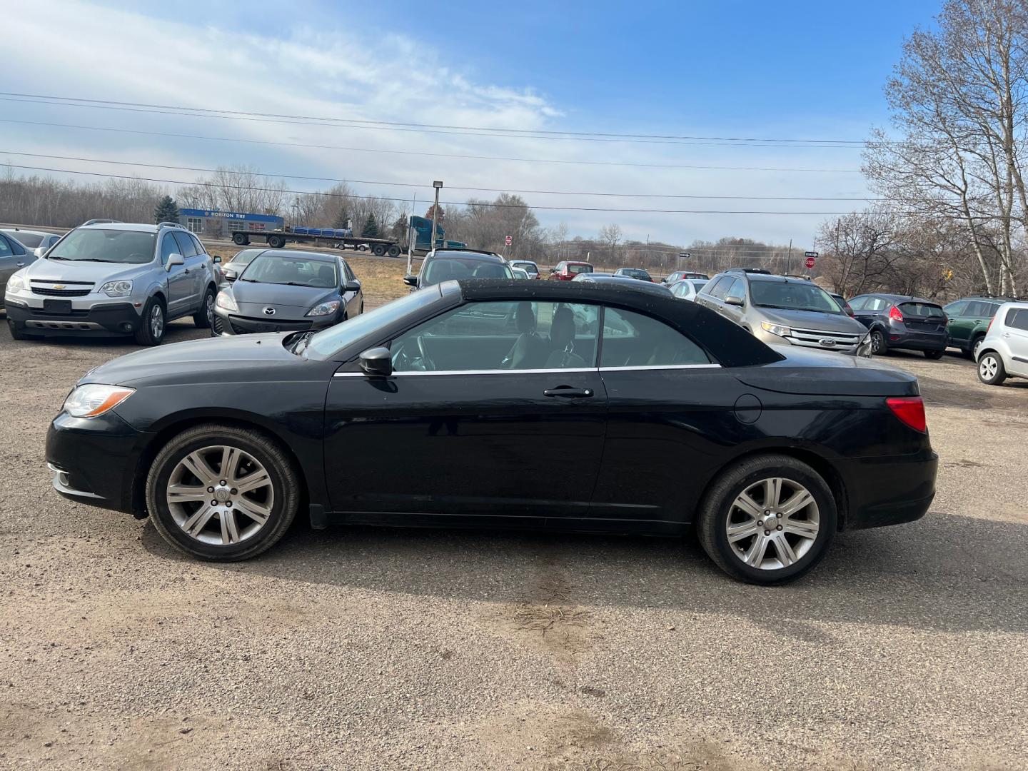 2011 Black Chrysler 200 Touring (1C3BC2EG4BN) with an 3.6L V6 DOHC 24V engine, 4-Speed Automatic transmission, located at 17255 hwy 65 NE, Ham Lake, MN, 55304, 0.000000, 0.000000 - Photo#1